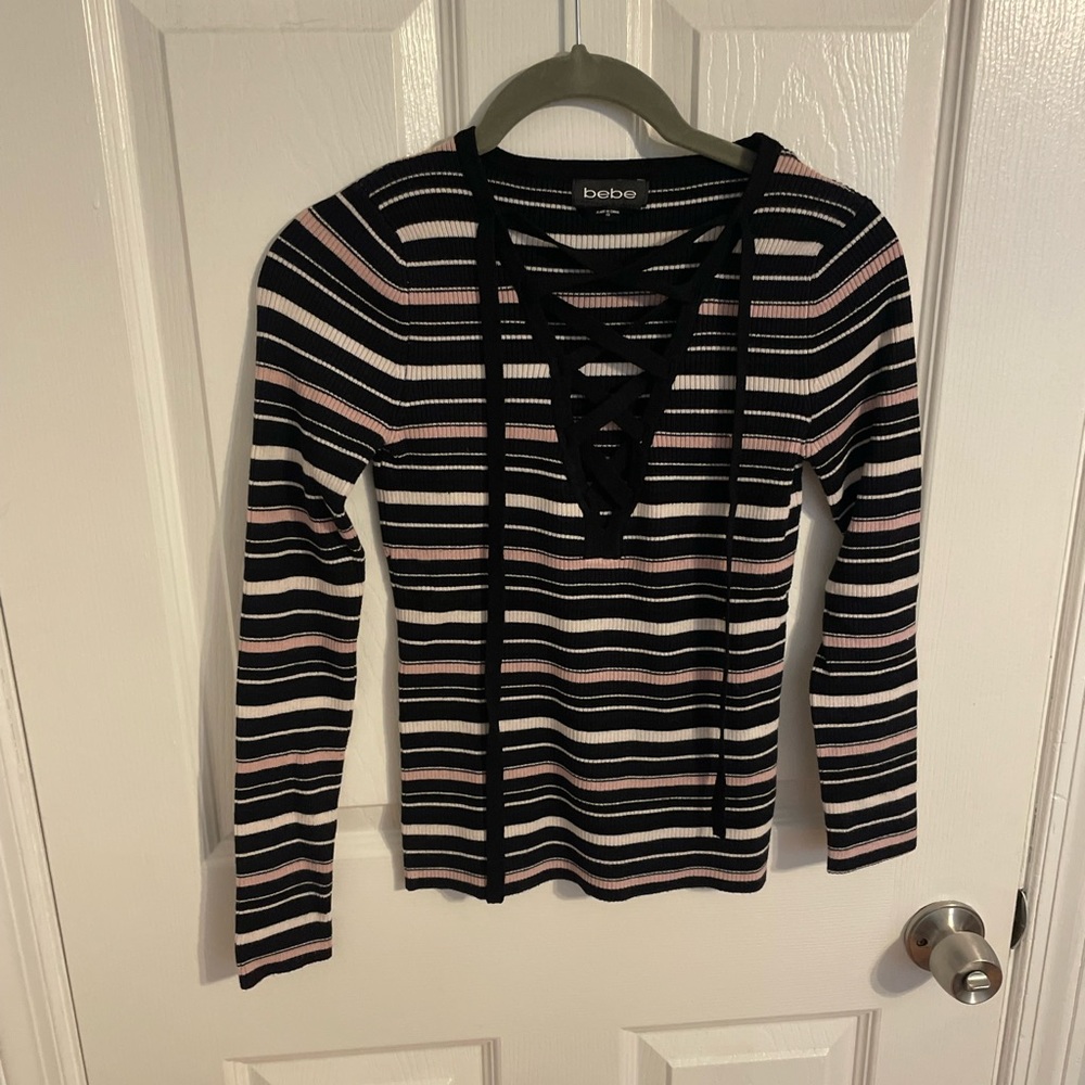 Pink white and black striped lace up Bebe shirt